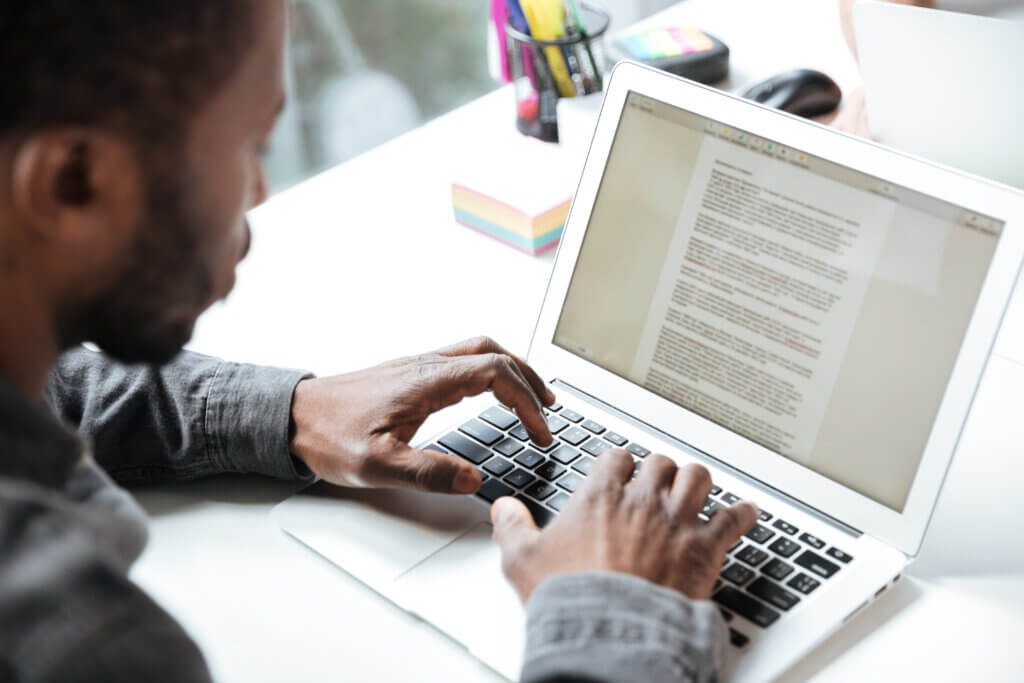 cropped photo serious young man sitting office coworking